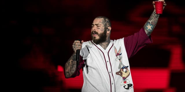 Post Malone, who recently fell into a hole on stage while preforming in St. Louis on Sept. 17, 2022, preforming in Rio de Janeiro on Sept. 4 2022.