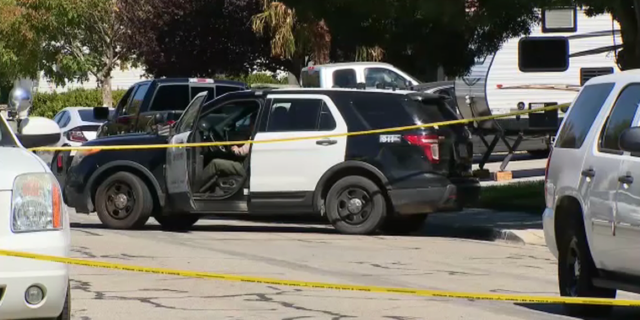 Law enforcement presence outside the home of slain Los Angeles County probation officer Paula Lind. 