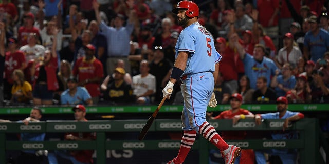 Albert Pujols #5 of the St. Louis Cardinals watches as his two run home run goes over the wall in the sixth inning during the game against the Pittsburgh Pirates at PNC Park on September 10, 2022 in Pittsburgh, Pennsylvania. The Home Run was the 696th of Pujols Career.