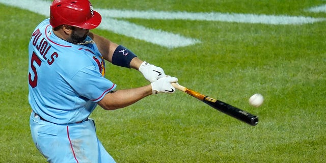 St. Louis Cardinals' Albert Pujols (5) hits a two-run home run off Pittsburgh Pirates starting pitcher JT Brubaker during the sixth inning of a baseball game in Pittsburgh, Saturday, Sept. 10, 2022.