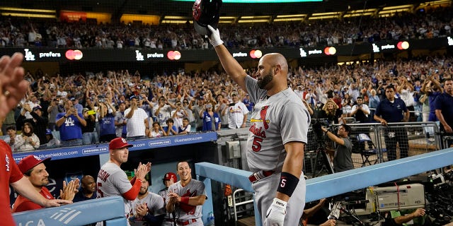 Designated hitter Albert Pujols, 5, of the St. Louis Cardinals celebrates after hitting a home run in the fourth inning of a baseball game against the Los Angeles Dodgers on Friday, Sept. 23, 2022 in Los Angeles. Brendan He also scored Donovan and Tommy Edman, which made Pujols' 700th career home run.