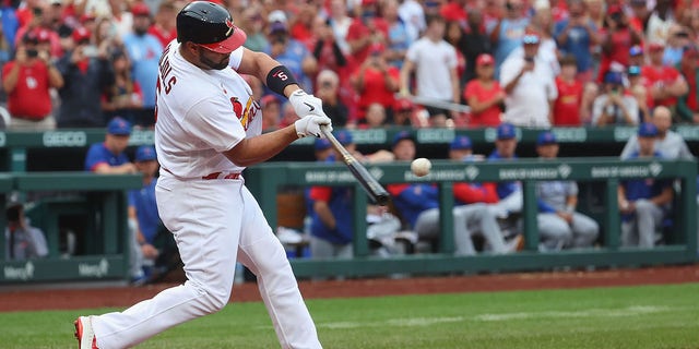 Albert Pujols of the St. Louis Cardinals hits the go-ahead, two-run home run, his 695th career home run, against the Chicago Cubs in the eighth inning at Busch Stadium on Sept. 4, 2022, in St Louis, Missouri.