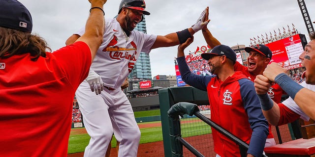 St. Louis Cardinals' Albert Pujols celebrates after hitting a go-ahead two-run homer for his 695th career home run in the eighth inning against the Chicago Cubs on Sept. 4, 2022 at Busch Stadium in St. Louis. I was.  , Missouri.
