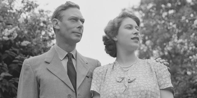 King George VI and and his daughter Elizabeth in the gardens at Windsor Castle, England, July 8, 1946.