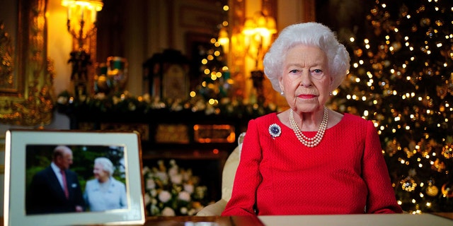 Queen Elizabeth II records her annual Christmas broadcast in the White Drawing Room in Windsor Castle, Berkshire Saturday, Dec. 25, 2021.
