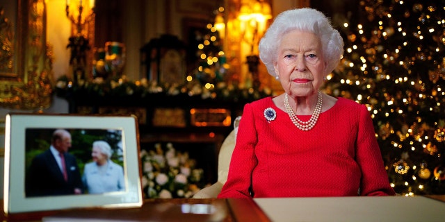 Queen Elizabeth II records her annual Christmas broadcast in the White Drawing Room in Windsor Castle, Berkshire Saturday, Dec. 25, 2021.