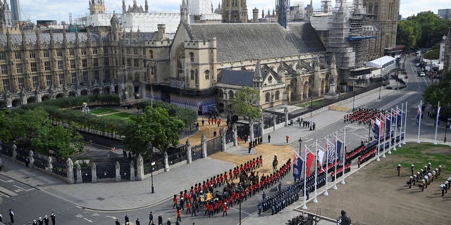 Queen Elizabeth II's coffin is moved from Buckingham Palace to the Houses of Parliament for her lying in state which will last four days until her funeral on Monday Sept. 19. 