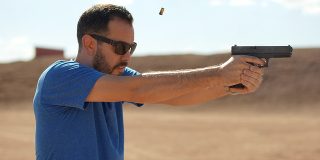 Raul Mendez fires a handgun in video for NRA.