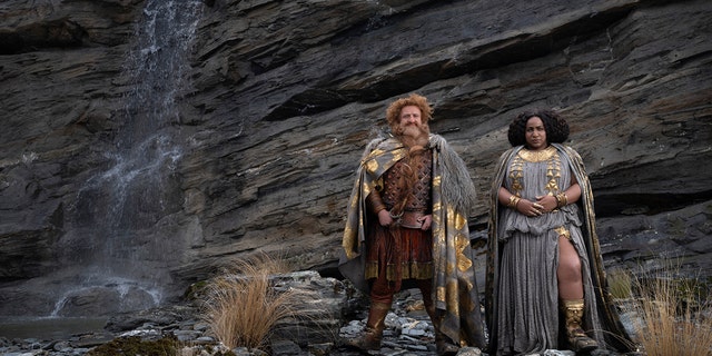 This image released by Amazon Studios shows Owen Arthur, left, and Sofia Nomwet in a scene "The Lord of the Rings: The Rings of Power."