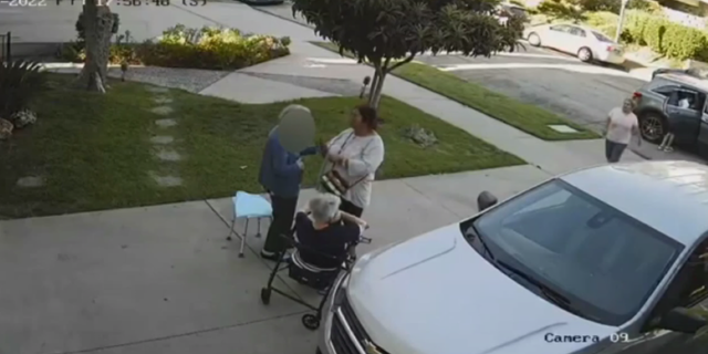 The elderly woman was approached by seemingly friendly thieves who stole her necklace.