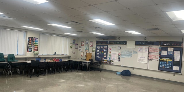 De'Quan Wilson photographed an empty classroom in Tampa - a room he usually teaches in - before evacuees arrived amid Hurricane Ian.