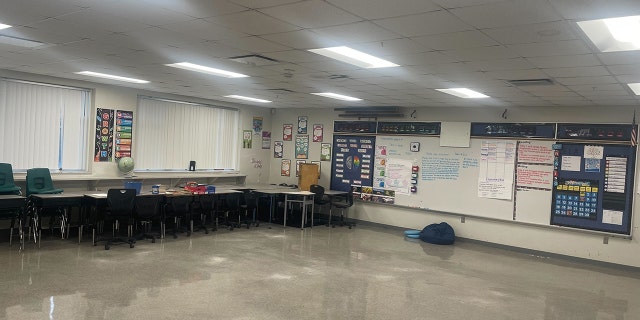 De'Quan Wilson photographed an empty classroom in Tampa - a room he usually teaches in - before evacuees arrived amid Hurricane Ian.