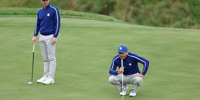 Rory McIlroy of Northern Ireland and Sergio Garcia of Spain are shown during a practice round prior to the 43rd Ryder Cup at Whistling Straits, in Kohler, Wisconsin, on Sept. 21, 2021.