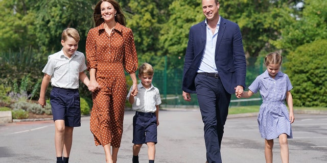 Prince George, Princess Charlotte and Prince Louis, accompanied by their parents the Prince William and Kate Middleton, arrive for a preview day at their new school.