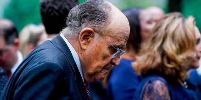 Rudy Giuliani, pictured here at the National September 11 Memorial & Museum in New York, on Sept. 11, 2022, was slapped on the back by a man while at a Staten Island grocery store this June.
