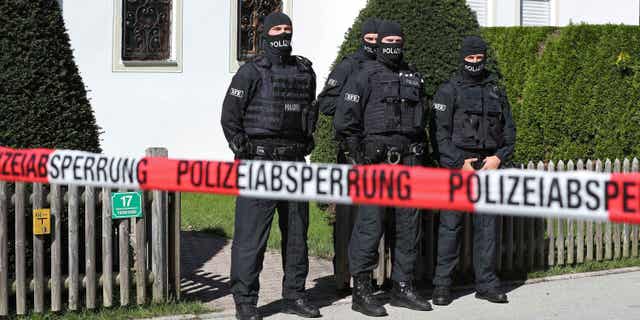 Russian oligarch Alisher Usmanov, close ally of Russian President Vladimir Putin, has been accused of laundering millions of dollars through offshore companies. Pictured:Â Alisher Usmanov's villa in Rottach-Egern, Germany, being raided on Sept. 21, 2022.