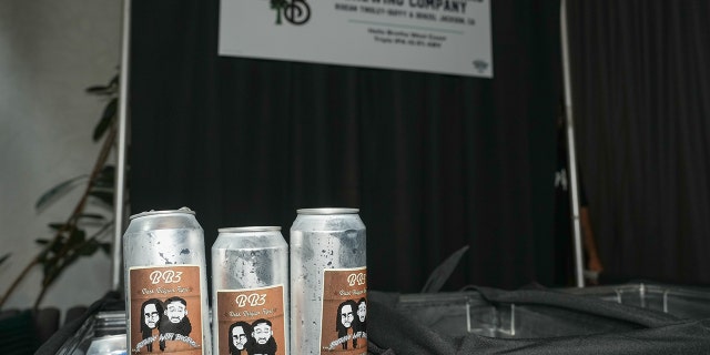 Three cans of Brewing with Brothas craft beer are shown at the first annual Samuel Adams Crafting Dreams Beer Bash in NYC on Sept. 7, 2022.