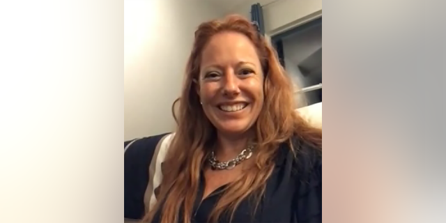 Retired nurse Tamara Panzino smiles during video interview.