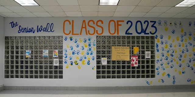 A school hallway is decorated with students' hand prints prior to the arrival of Hurricane Ian in Florida.