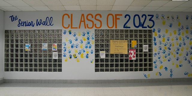 A school hallway is decorated with students' hand prints prior to the arrival of Hurricane Ian in Florida.