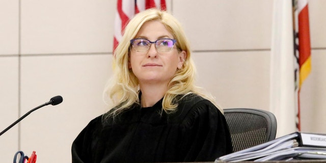 Judge Jennifer J. O'Keefe glances at a slide of a photo of evidence at the Kristin Smart murder trial on Sept. 19, 2022, at the Monterey County Superior Court in Salinas, CA.