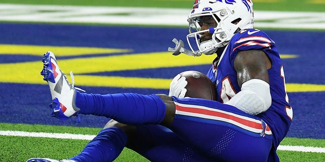 Wide receiver Stefon Diggs #14 of the Buffalo Bills catches a 53-yard touchdown reception against the Los Angeles Rams during the fourth quarter of the NFL game at SoFi Stadium on September 08, 2022 in Inglewood, California.