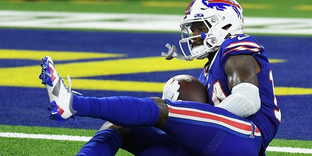 Wide receiver Stefon Diggs #14 of the Buffalo Bills catches a 53-yard touchdown reception against the Los Angeles Rams during the fourth quarter of the NFL game at SoFi Stadium on September 08, 2022 in Inglewood, California.