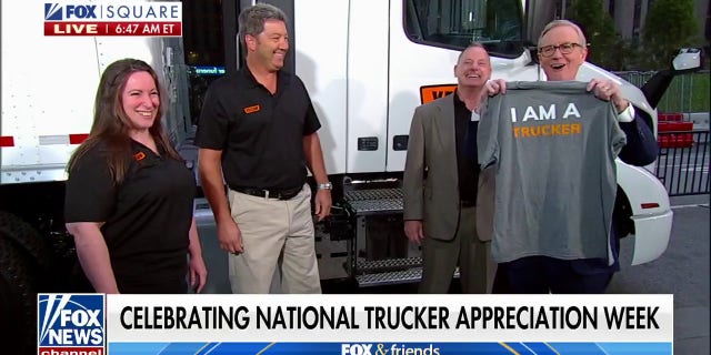 Yellow Trucking presents "Fox and Friends" co-host Steve Doocy with an honorary trucker T-shirt for National Trucker Appreciation Week on Friday, Sept. 16, 2022.