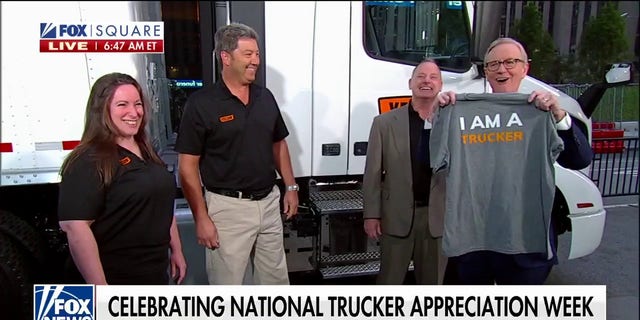 Yellow Trucking presents "Fox and Friends" co-host Steve Doocy with an honorary trucker T-shirt for National Trucker Appreciation Week on Friday, Sept. 16, 2022.