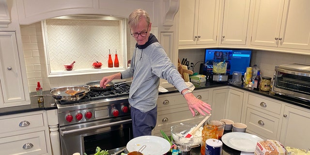 Steve Doocy cooking at home. "Ultimately what we're trying to do is help America come up with fun, interesting, delicious things to make for dinner — and maybe some great leftovers for the middle of the night," he says in his book.