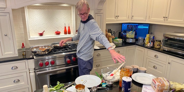 Steve Doocy cooking at home. "Ultimately what we're trying to do is help America come up with fun, interesting, delicious things to make for dinner — and maybe some great leftovers for the middle of the night," he says in his book.