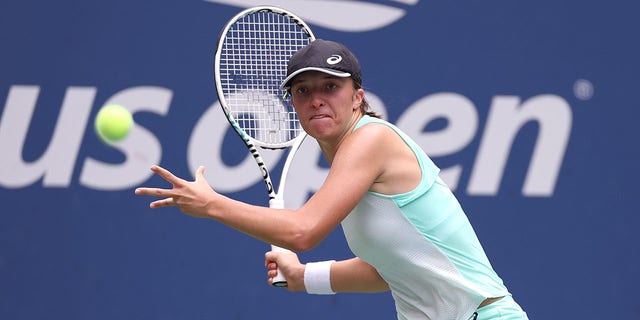 Iga Swiatek of Poland returns a shot against Jule Niemeier of Germany during their Women’s Singles Fourth Round match on Day Eight of the 2022 US Open at USTA Billie Jean King National Tennis Center on September 05, 2022 in the Flushing neighborhood of the Queens borough of New York City.