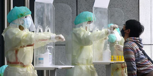 Pictured: A person gets a COVID-19 test in Taipei, Taiwan on May 24, 2022.