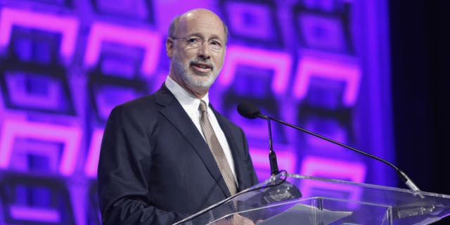Gov. Tom Wolf argues that Republicans are improperly bundling five unrelated proposed amendments to the state's constitution. Pictured: Gov. Tom Wolf giving a speech at the Pennsylvania Convention Center on Nov. 19, 2015, in Philadelphia, Pennsylvania.