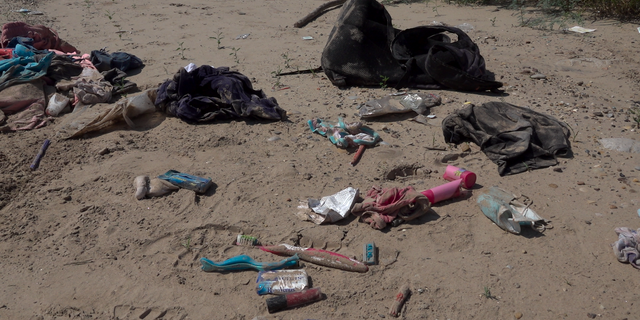 Trash left by migrants who crossed the Rio Grande from Mexico into Texas.