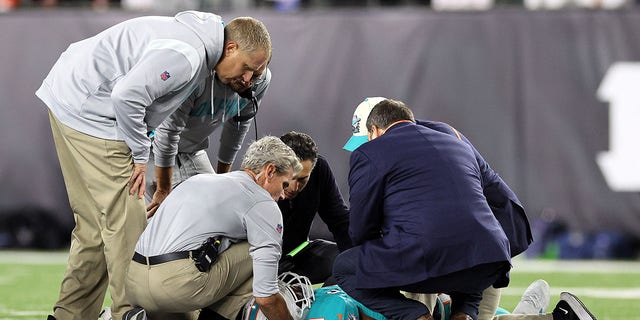 Medical staff tend to quarterback Tua Tagovailoa of the Miami Dolphins after an injury during the second quarter of the game against the Cincinnati Bengals at Paycor Stadium in Cincinnati, Ohio, on Thursday.