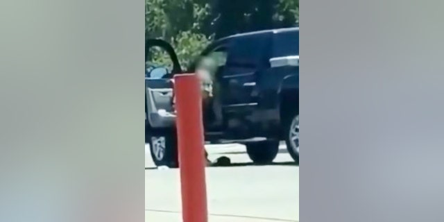 Screenshot from raw video where Texas grandpa, alleged armed robber fought.