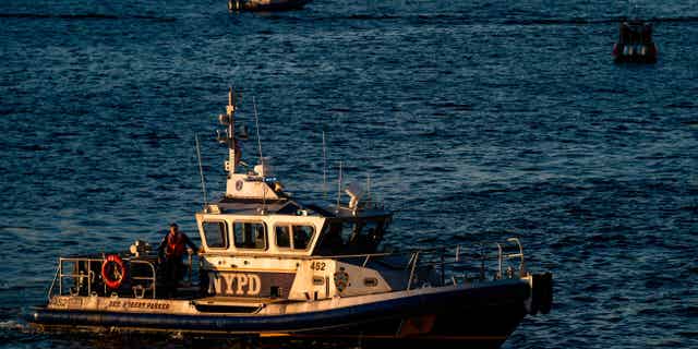 A NYPD police boat is seen patrolling the East River in New York City, on Sept. 21, 2022.