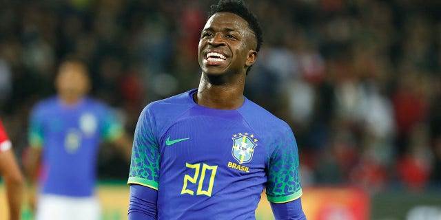 Vinicius Jr. #20 of Brazil reacts to a play during the international friendly match between Brazil and Tunisia at the Parc des Princes on September 27, 2022 in Paris, France.