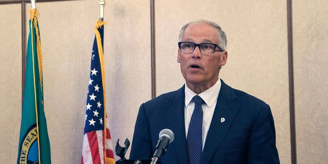 Washington Gov. Jay Inslee announces during a news conference in Olympia, Washington, on Sept. 8, 2022, that the COVID-19 state of emergency will end Oct. 31.