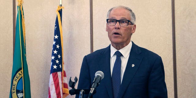 Washington Gov. Jay Inslee announces during a news conference in Olympia, Washington, on Sept. 8, 2022, that the COVID-19 state of emergency will end Oct. 31.