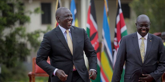 Kenya's President-Elect William Ruto, left, jokes with Deputy President-Elect Rigathi Gachagua, right, as he addresses the media at his official residence in Nairobi, Kenya Monday, Sept. 5, 2022.