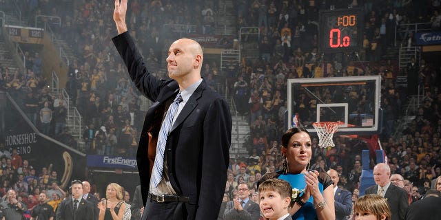 Zydrunas Ilgauskas #11 of the Cleveland Cavaliers thanks his fans during halftime of the game against the New York Knicks at The Quicken Loans Arena on March 8, 2014 in Cleveland, Ohio.