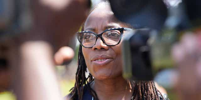 Zimbabwean author Tsitsi Dangarembga speaks with press in Harare, Zibabwe, on Sept. 29, 2022, after she was found guilty of promoting public violence during a protest in 2020.