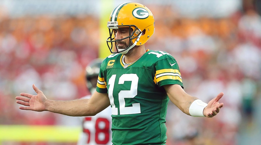 Aaron Rodgers suggests he played part in Bucs' penalty during 2-point try
