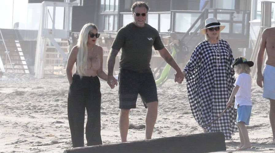 Tori Spelling, Dean McDermott and Candy Spelling hold hands during Tori Spelling, Dean McDermott and Candy Spelling hold hands during