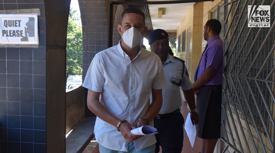 Bradley Dawson escorted to the cell block at the High Court in Lautoka, Fiji