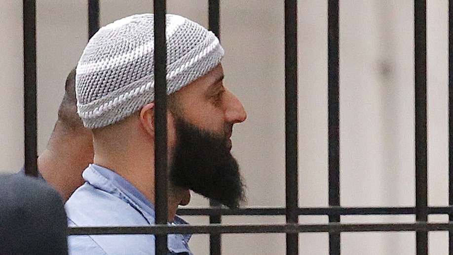 Adnan Syed is pictured behind bars