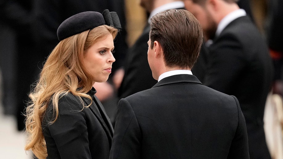 Princess Beatrice looks to her husband Edward Mapelli during Queen Elizabeth's state funeral