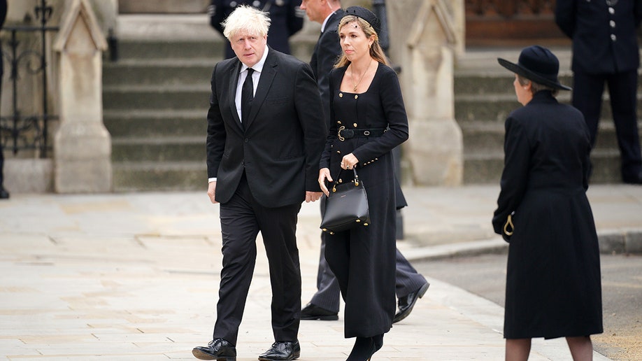Former British PM Boris Johnson and his wife arrive in all black to attend Queen Elizabeth's state funeral